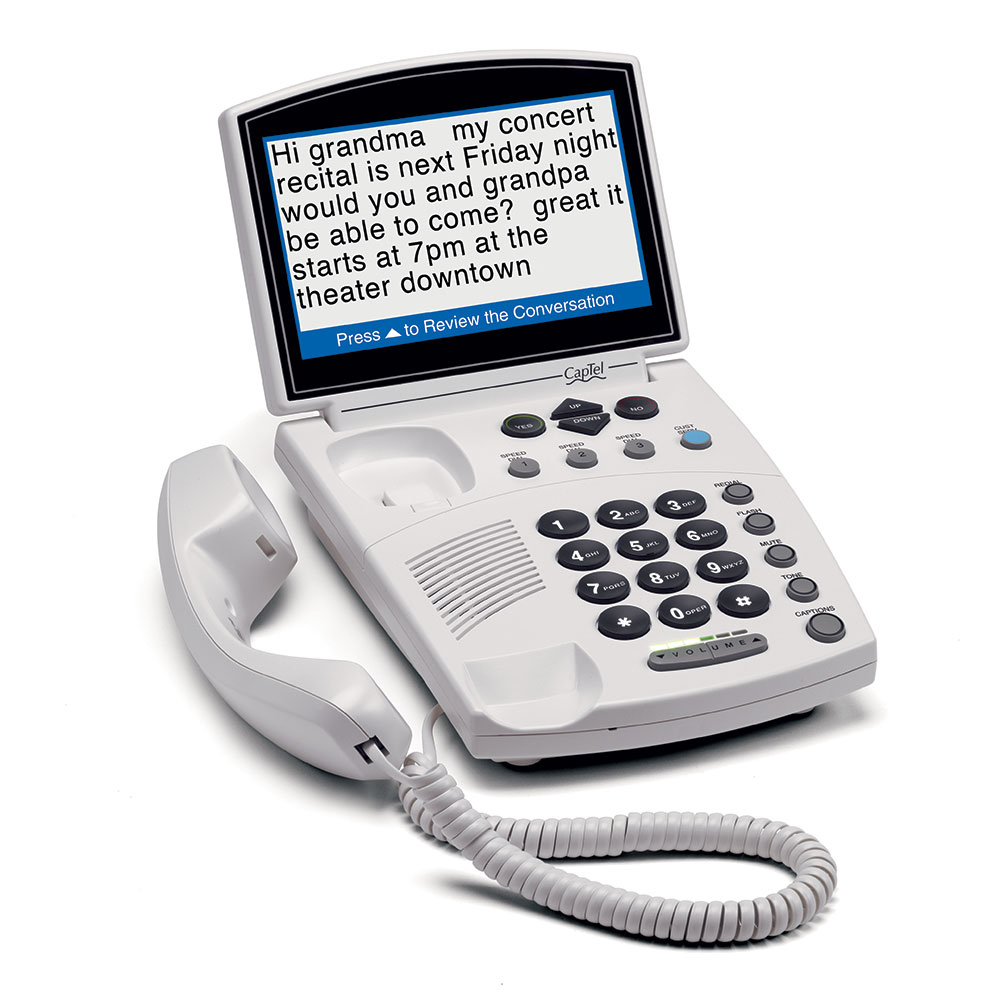 phone with a large screen above the dial pad that displays a caption of the call